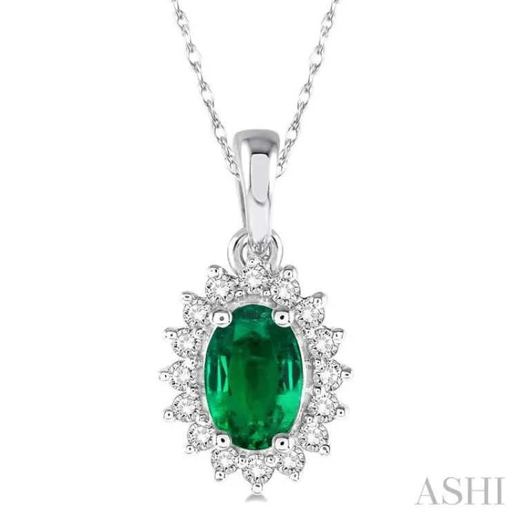 1/8 Ctw Round Cut Diamond and Oval Cut 6x4 MM Emerald Center Sunflower Precious Pendant in 10K White Gold with chain