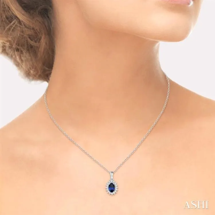 1/8 Ctw Round Cut Diamond and Oval Cut 6x4mm Sapphire Center Sunflower Precious Pendant in 10K White Gold with chain