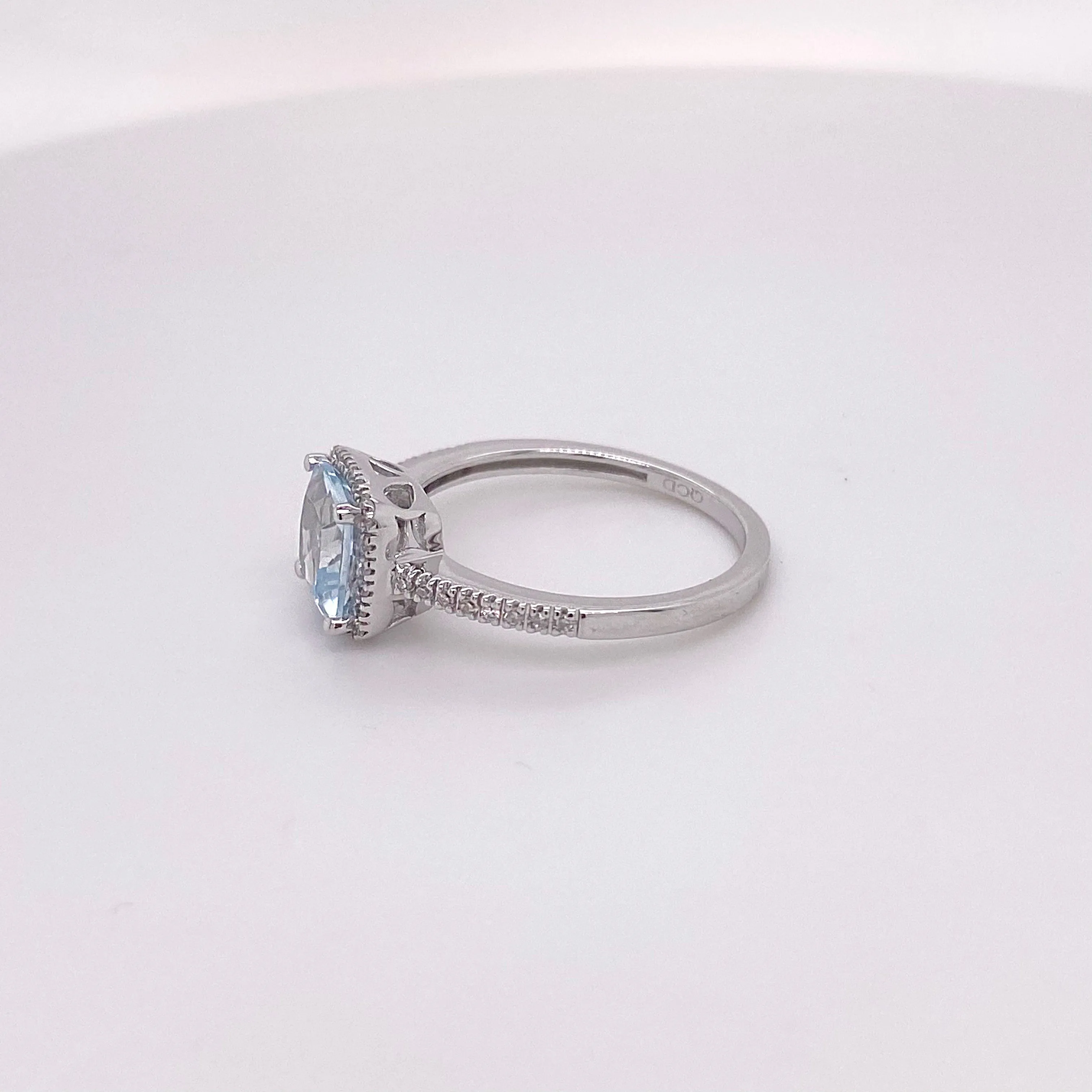 Aquamarine and Diamond Halo Engagement Ring