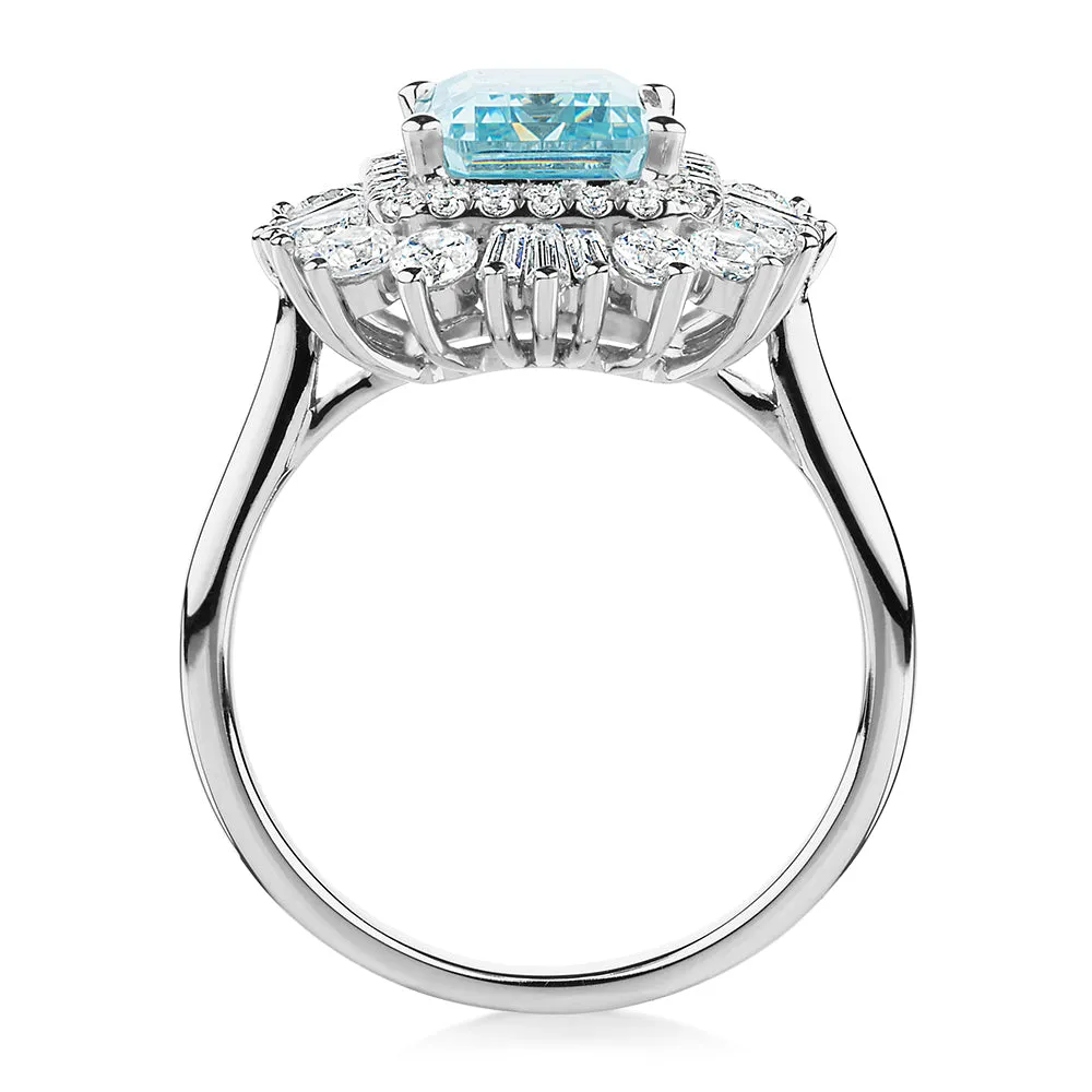 Dress ring with 9x7mm aquamarine simulant and 1.43 carats* of diamond simulants in 10 carat white gold