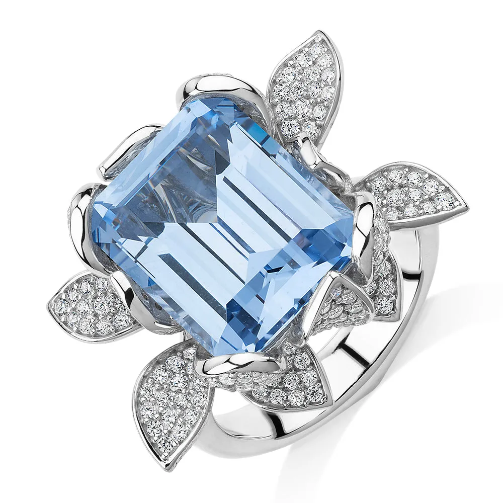 Dress ring with aquamarine simulant and 1.74 carats* of diamond simulants in sterling silver