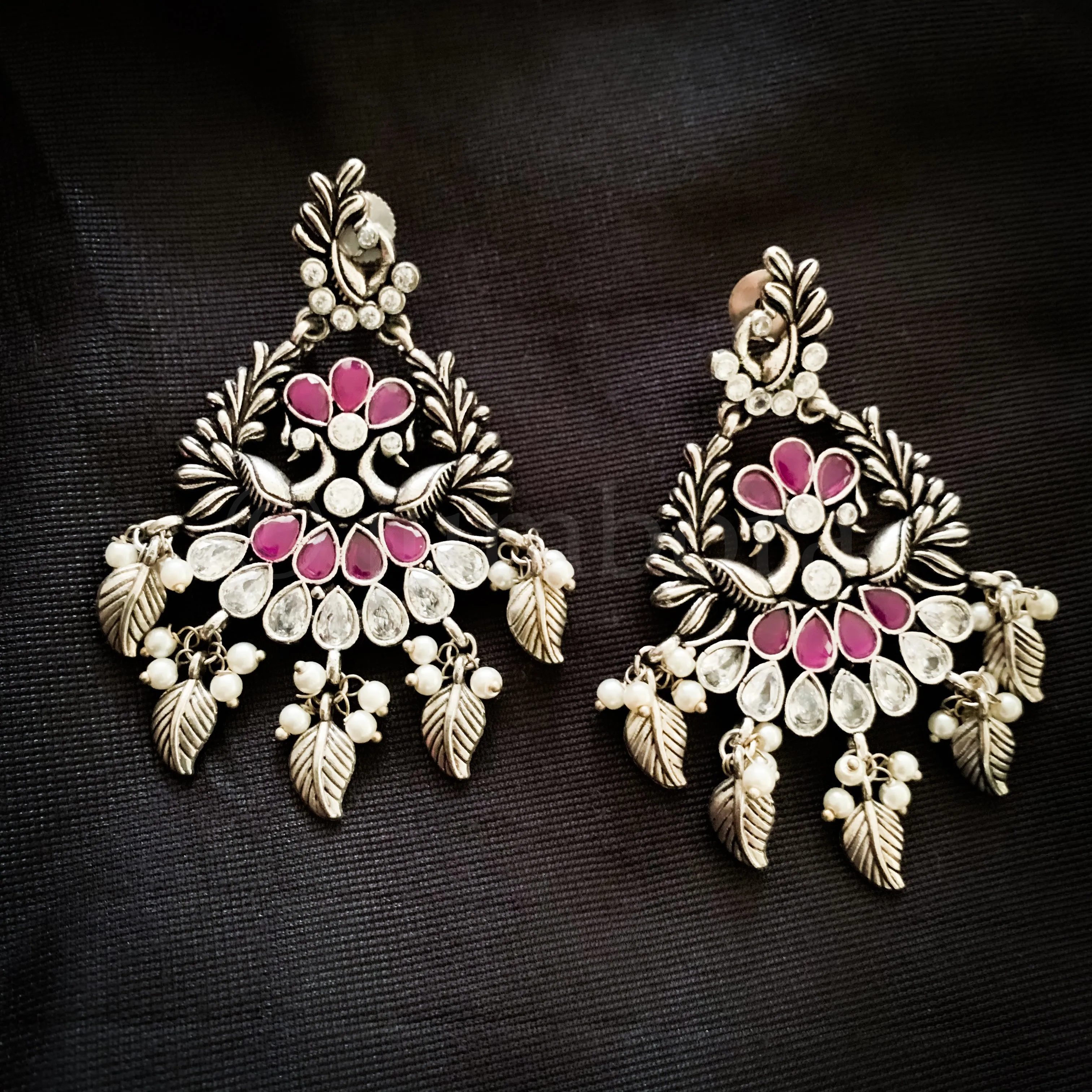 Fashionable Long Oxidized Silver Peacock Earring with Ruby red and White stones