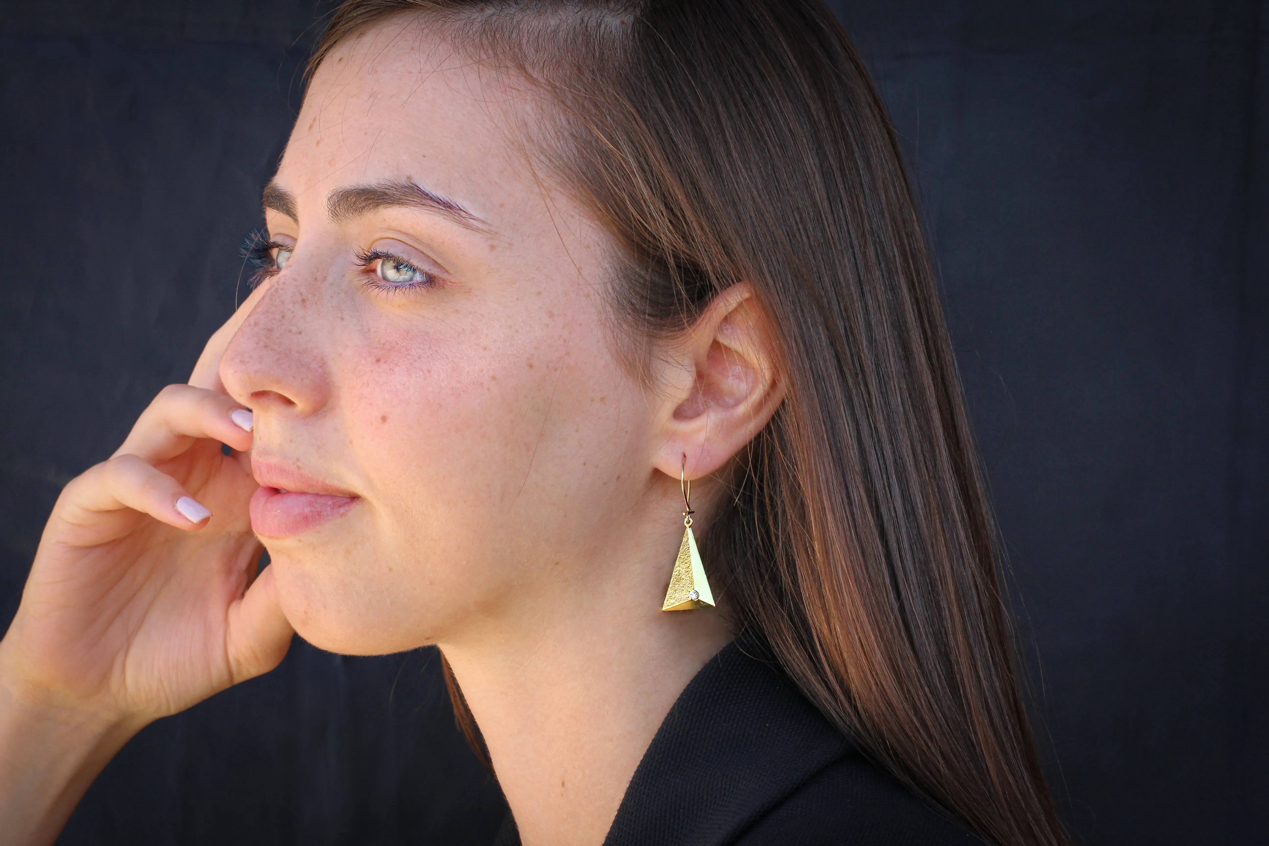 Hanging triangle gold earrings